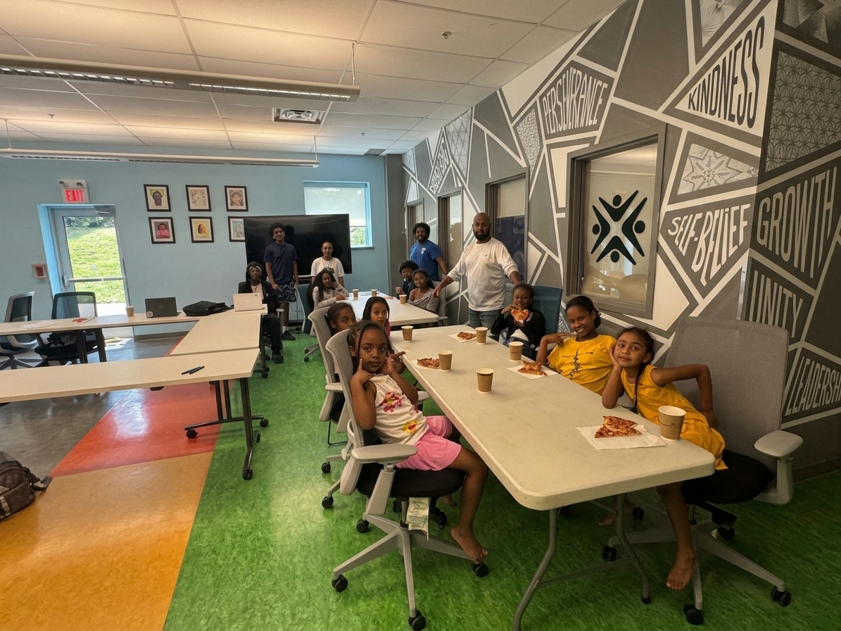 Families sharing food together at an outdoor multicultural community festival